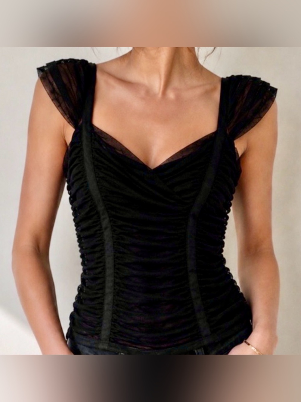BCBGMaxAzria Black Ruched and Tulle top.